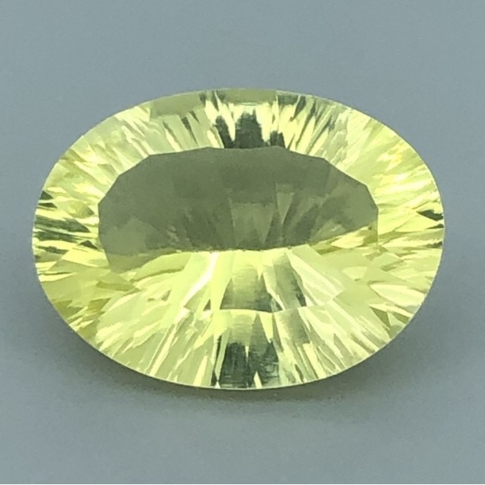 10.95 Carats Natural Lemon Quartz Oval Cut Concave Faceted Gemstone